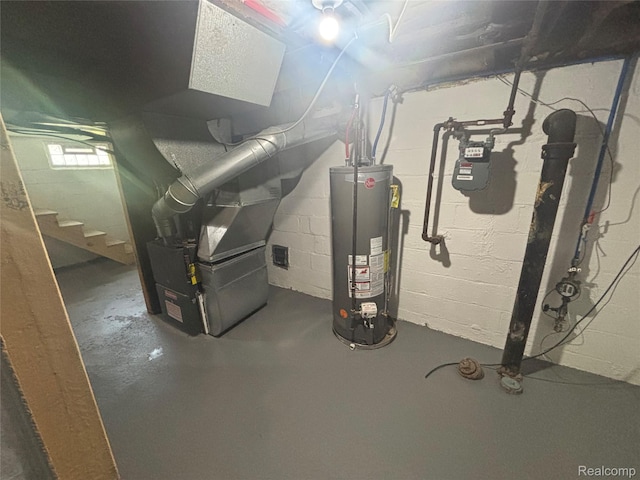910 Spence St, Southfield, MI 48340 - basement with water heater, stairs, and concrete block wall