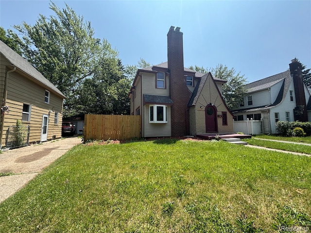 910 Spence St, Southfield, MI 48340 - view of front facade with a chimney
