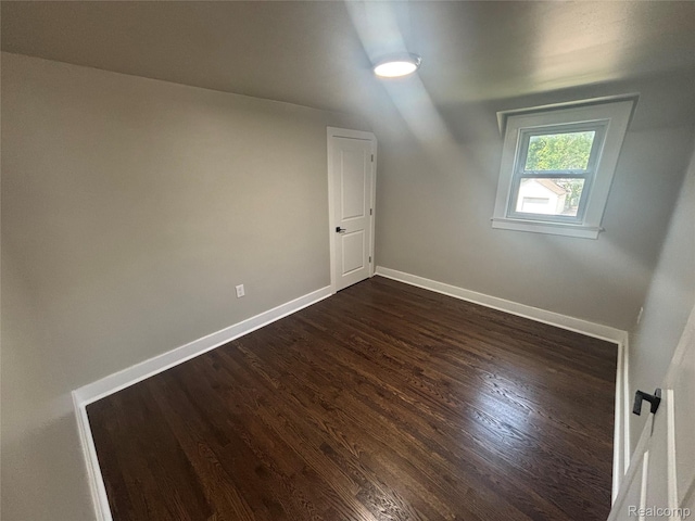 910 Spence St, Southfield, MI 48340 - bonus room featuring dark wood finished floors and baseboards