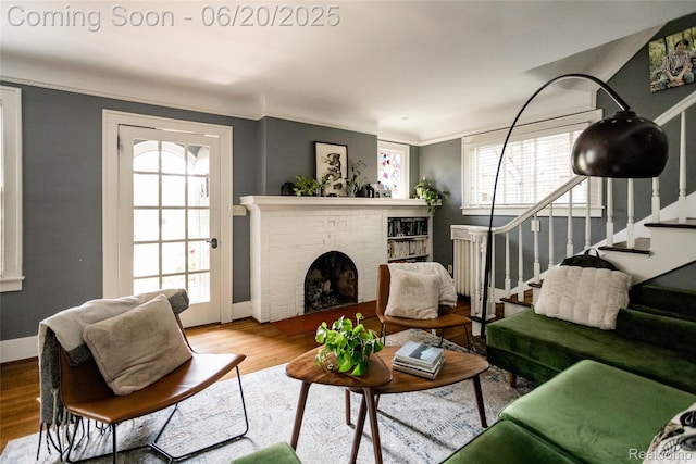55 Oakdale Blvd, Pleasant Ridge, MI 48069 - living area with stairway, wood finished floors, and a fireplace