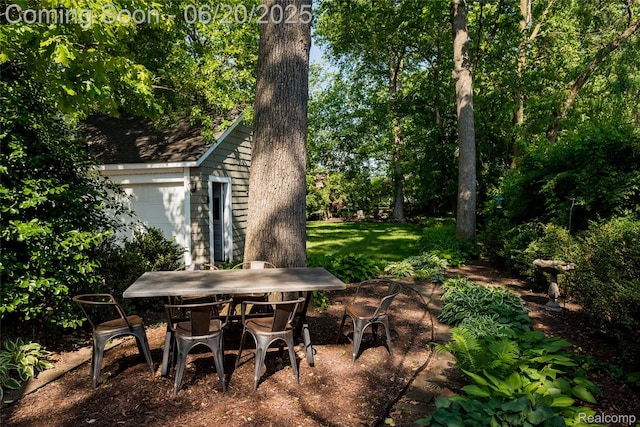 55 Oakdale Blvd, Pleasant Ridge, MI 48069 - view of patio with outdoor dining area and a storage shed