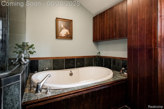 55 Oakdale Blvd, Pleasant Ridge, MI 48069 - bathroom featuring a bath and lofted ceiling