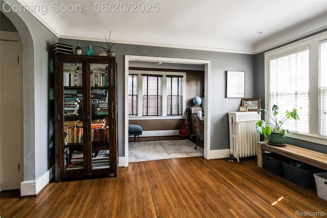 55 Oakdale Blvd, Pleasant Ridge, MI 48069 - entryway with wood finished floors, arched walkways, and crown molding