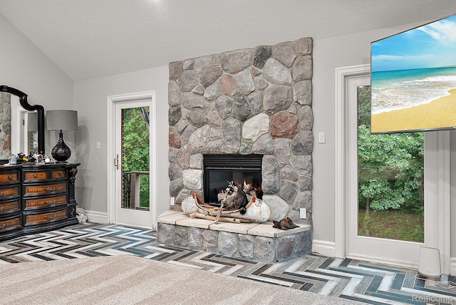 429 Hawk High Hill Rd, Metamora, MI 48455 - living room with vaulted ceiling and a fireplace
