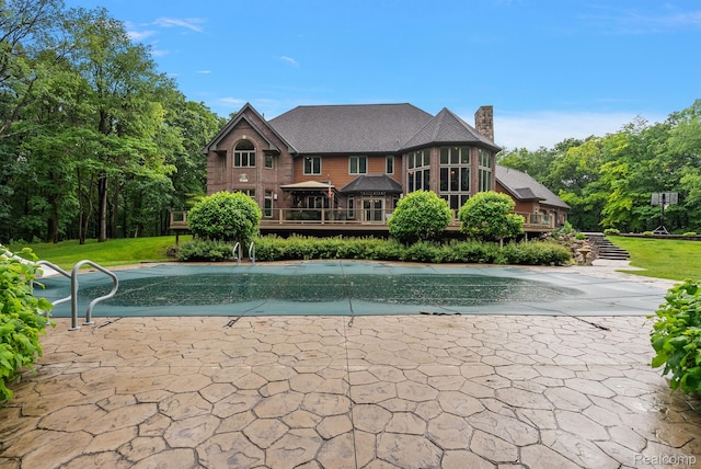 429 Hawk High Hill Rd, Metamora, MI 48455 - view of pool with a covered pool, a lawn, and a deck