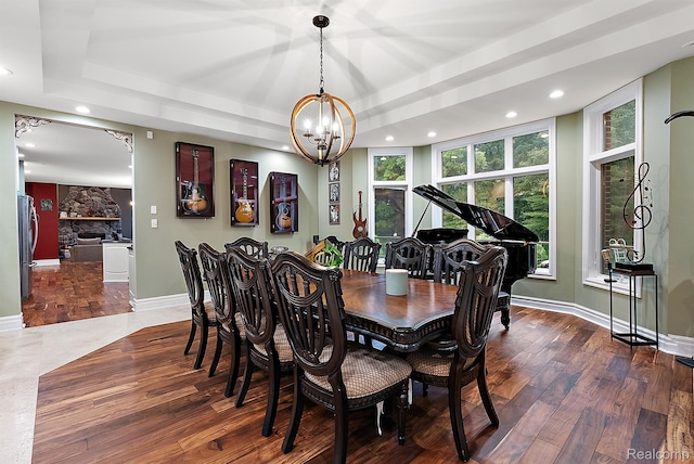 429 Hawk High Hill Rd, Metamora, MI 48455 - dining area featuring a chandelier, recessed lighting, wood finished floors, and a fireplace