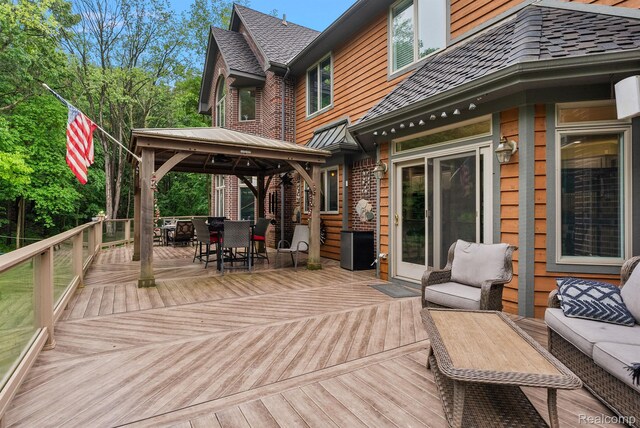 429 Hawk High Hill Rd, Metamora, MI 48455 - wooden terrace with a gazebo and outdoor dining space
