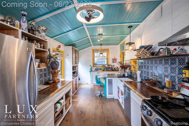 1200 Porter St, Detroit, MI 48226 - kitchen featuring stainless steel appliances, open shelves, wood counters, dark wood-style floors, and wooden ceiling