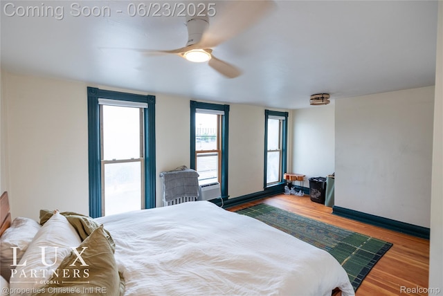 1200 Porter St, Detroit, MI 48226 - bedroom with wood finished floors and a ceiling fan