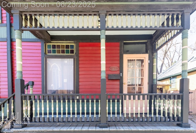 1200 Porter St, Detroit, MI 48226 - property entrance with a balcony and covered porch