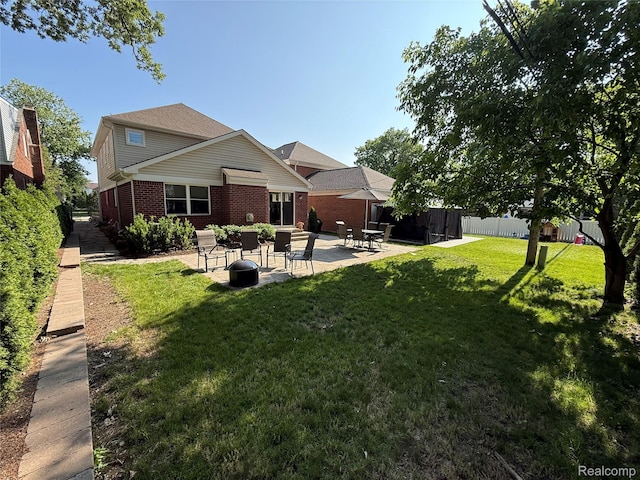 23540 Wilson Ave, Dearborn, MI 48128 - rear view of house with a patio and brick siding