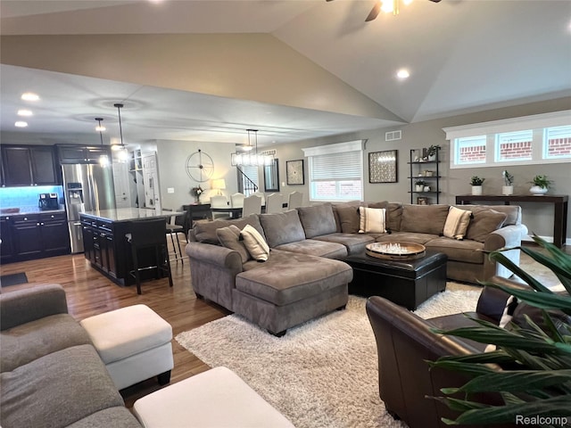 23540 Wilson Ave, Dearborn, MI 48128 - living room featuring lofted ceiling, wood finished floors, ceiling fan, and recessed lighting