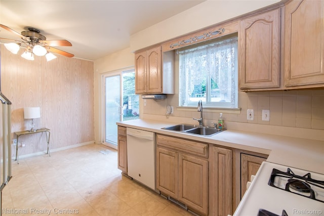2139 Pagel Ave, Lincoln Park, MI 48146 - kitchen with dishwasher, light countertops, backsplash, a ceiling fan, and light brown cabinets