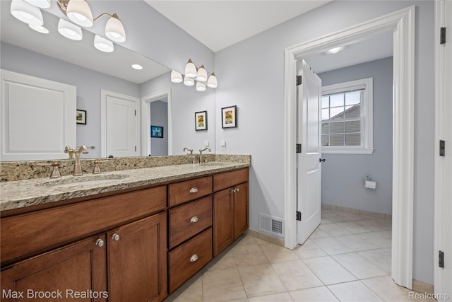 2534 Buckingham Ave, Birmingham, MI 48009 - full bathroom with double vanity and tile patterned flooring
