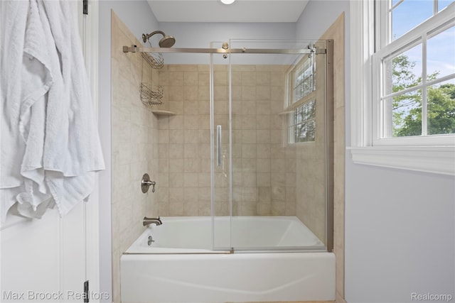 2534 Buckingham Ave, Birmingham, MI 48009 - bathroom with plenty of natural light and combined bath / shower with glass door