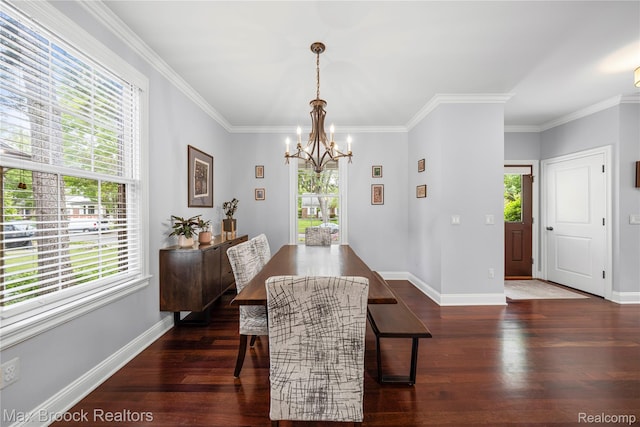 2534 Buckingham Ave, Birmingham, MI 48009 - dining space with a chandelier, wood finished floors, and crown molding