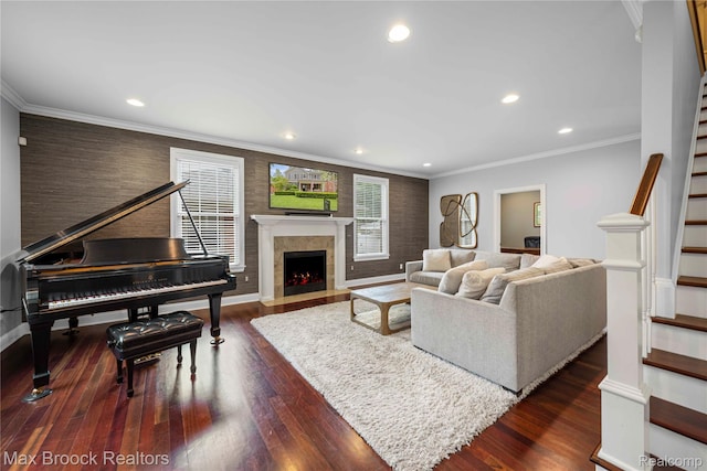 2534 Buckingham Ave, Birmingham, MI 48009 - living room with stairway, recessed lighting, dark wood-type flooring, a fireplace with flush hearth, and ornamental molding