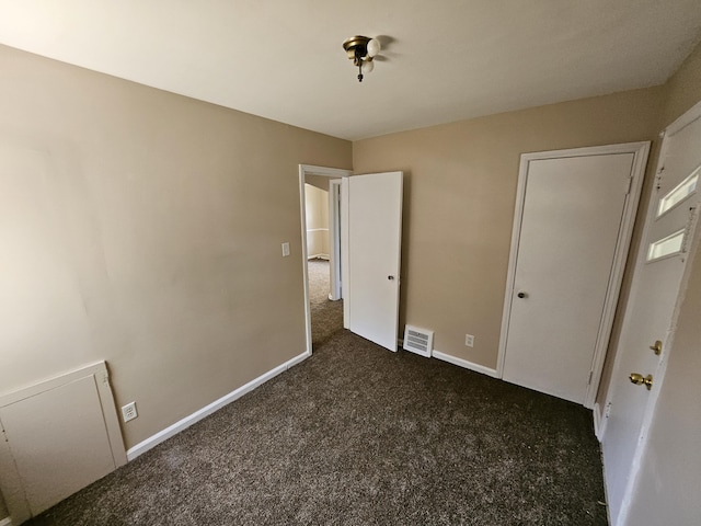 18242 Mendota St, Detroit, MI 48221 - unfurnished bedroom featuring carpet flooring and baseboards