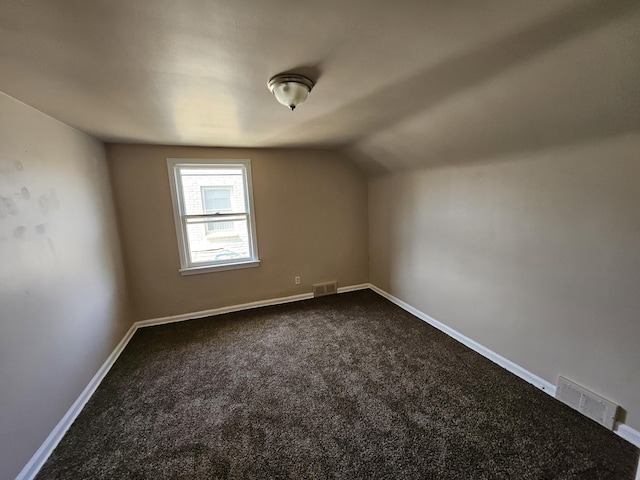 18242 Mendota St, Detroit, MI 48221 - bonus room featuring dark carpet and lofted ceiling