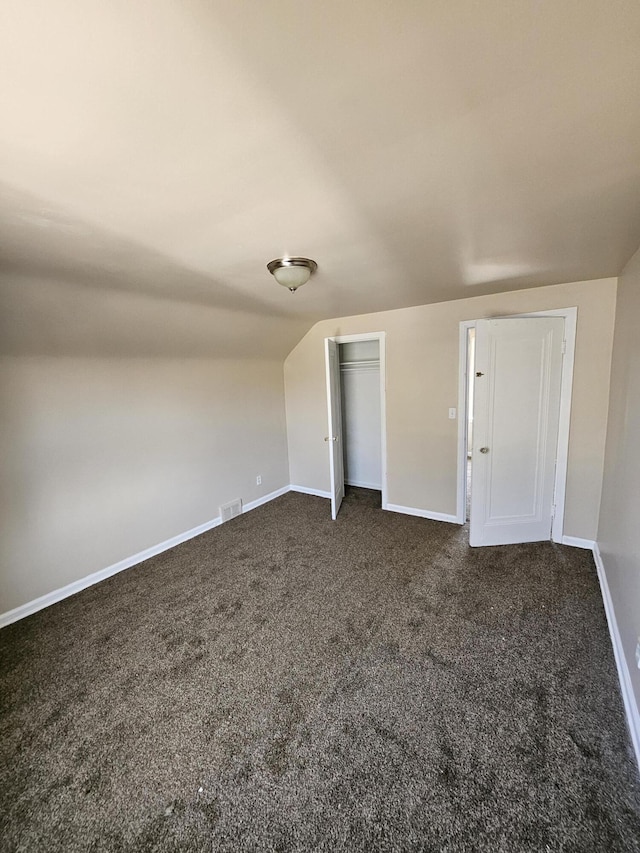 18242 Mendota St, Detroit, MI 48221 - bonus room featuring dark carpet and baseboards
