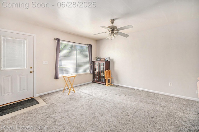 1465 E Judd Rd, Burton, MI 48529 - foyer with carpet floors and ceiling fan