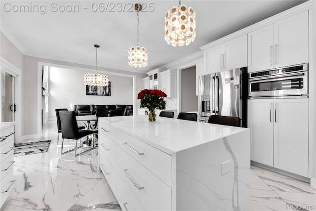 56727 Via Carlotta, Shelby Twp, MI 48042 - kitchen featuring a chandelier, stainless steel appliances, white cabinets, light marble finish flooring, and crown molding