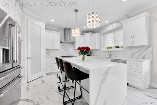 56727 Via Carlotta, Shelby Twp, MI 48042 - kitchen featuring wall chimney exhaust hood, stainless steel appliances, recessed lighting, a chandelier, and light marble finish flooring