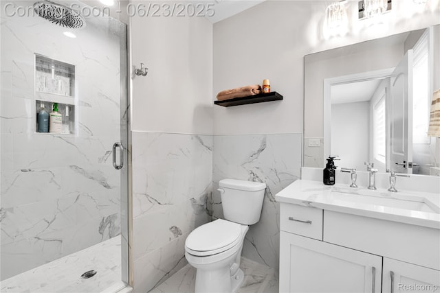 56727 Via Carlotta, Shelby Twp, MI 48042 - full bath with marble finish flooring, vanity, a marble finish shower, a wainscoted wall, and tile walls