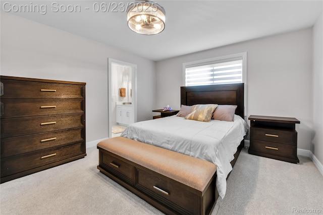 56727 Via Carlotta, Shelby Twp, MI 48042 - bedroom with light carpet, a chandelier, and ensuite bath