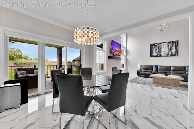 56727 Via Carlotta, Shelby Twp, MI 48042 - dining area with a chandelier, light marble finish flooring, and plenty of natural light
