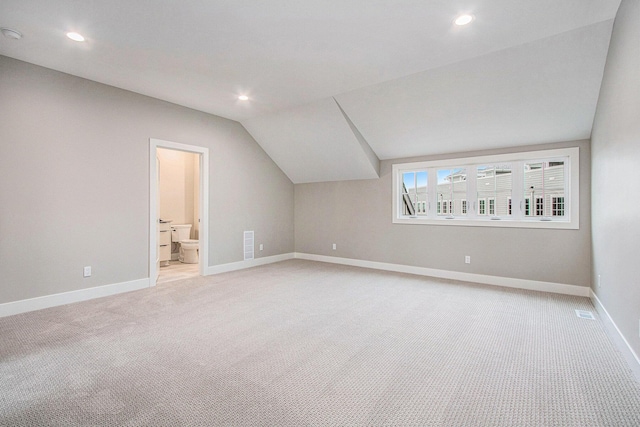 994 Harbor Dr E, Saint Joseph, MI 49085 - bonus room featuring light colored carpet, vaulted ceiling, and recessed lighting
