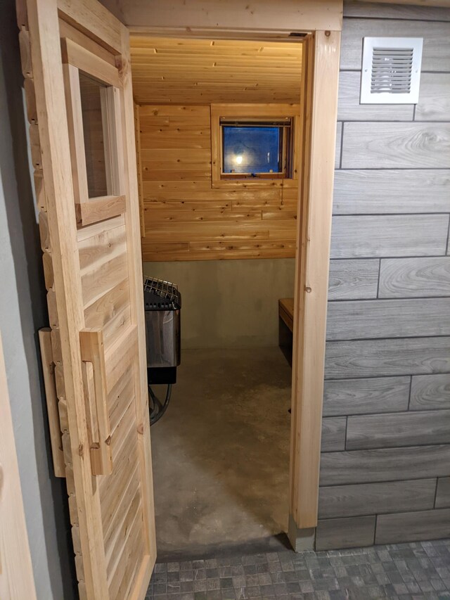 539 Sunset Ln, East Lansing, MI 48823 - relaxing sauna / steam room featuring concrete floors