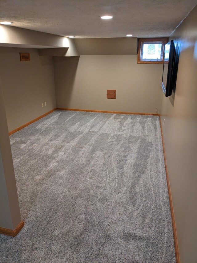 539 Sunset Ln, East Lansing, MI 48823 - basement featuring carpet floors and recessed lighting