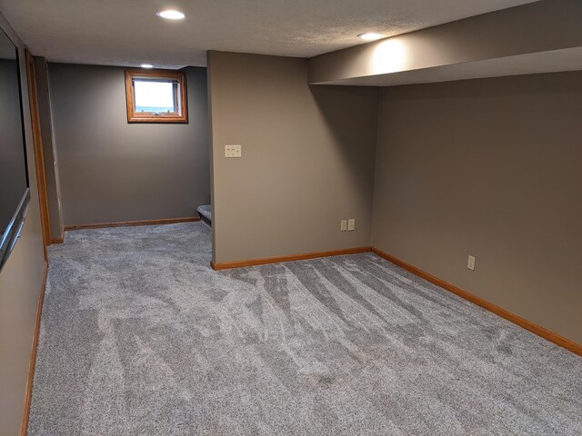 539 Sunset Ln, East Lansing, MI 48823 - basement with carpet floors and recessed lighting