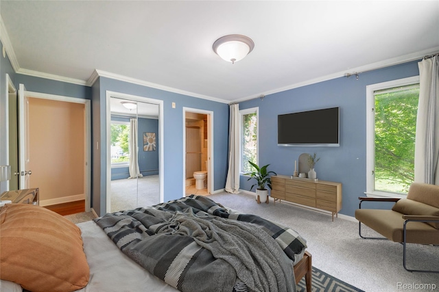 19891 Parke Ln, Grosse Ile, MI 48138 - carpeted bedroom featuring multiple windows, crown molding, and ensuite bathroom