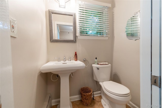 19891 Parke Ln, Grosse Ile, MI 48138 - bathroom with a baseboard heating unit and tile patterned floors