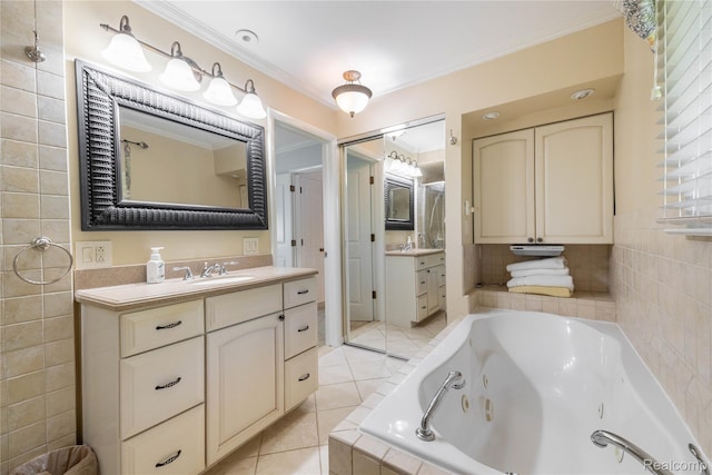 19891 Parke Ln, Grosse Ile, MI 48138 - full bath with crown molding, vanity, a whirlpool tub, tile patterned flooring, and tile walls