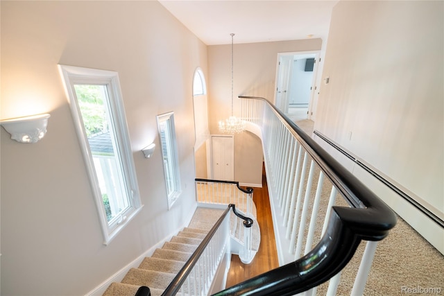 19891 Parke Ln, Grosse Ile, MI 48138 - staircase featuring a baseboard heating unit