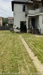 2118 Vinewood St, Detroit, MI 48216 - back of house with a balcony