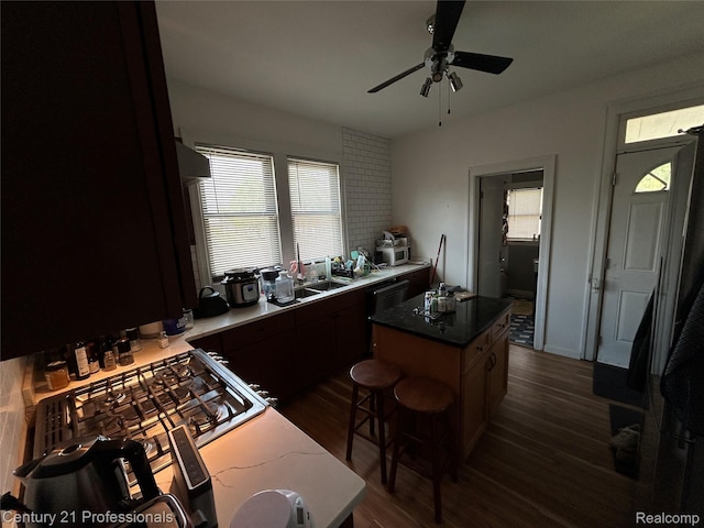 2118 Vinewood St, Detroit, MI 48216 - kitchen featuring a ceiling fan, dark wood-type flooring, and a center island