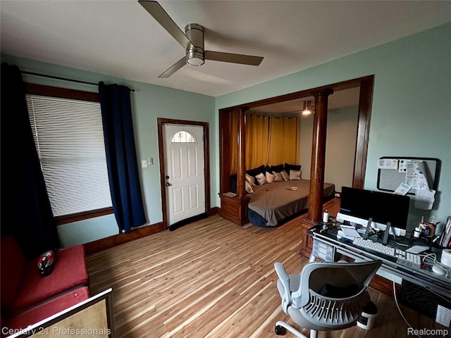 2118 Vinewood St, Detroit, MI 48216 - bedroom featuring light wood-style flooring, ceiling fan, and ornate columns