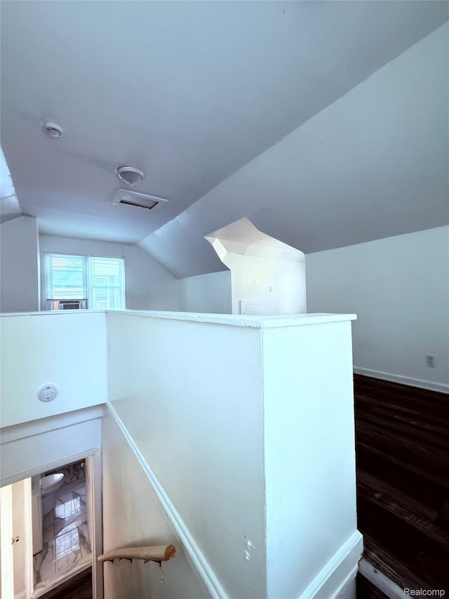 9941 Minock St, Detroit, MI 48228 - stairway featuring vaulted ceiling and wood finished floors