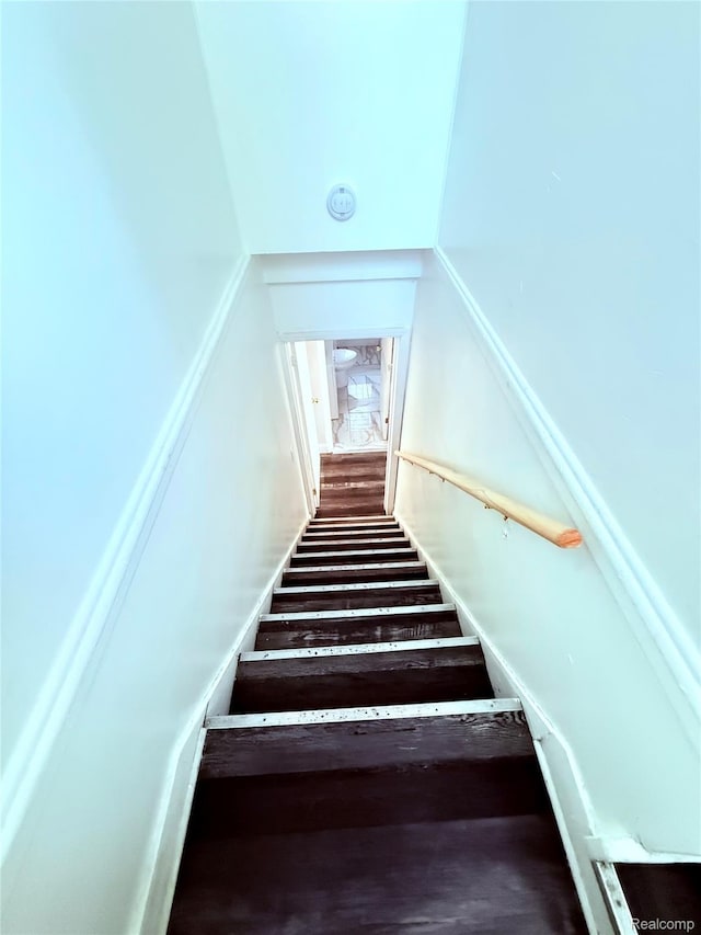 9941 Minock St, Detroit, MI 48228 - staircase featuring wood finished floors