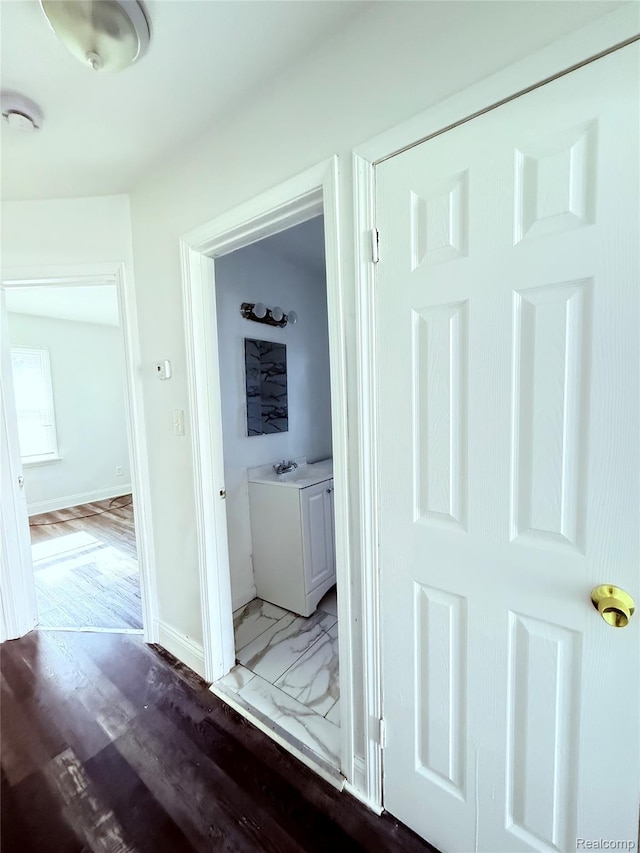 9941 Minock St, Detroit, MI 48228 - hall featuring baseboards and wood finished floors