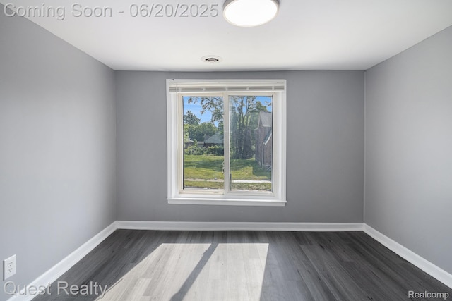 20863 Garden Ln, Ferndale, MI 48220 - unfurnished room featuring baseboards and dark wood-type flooring