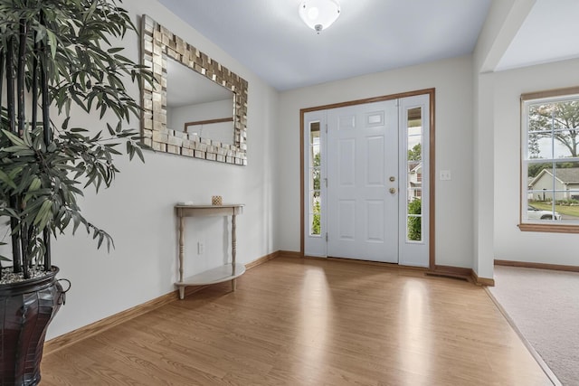 1860 Partridge Ln, Kalamazoo, MI 49009 - foyer entrance featuring wood finished floors and baseboards