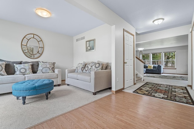 1860 Partridge Ln, Kalamazoo, MI 49009 - living area with wood finished floors and stairs