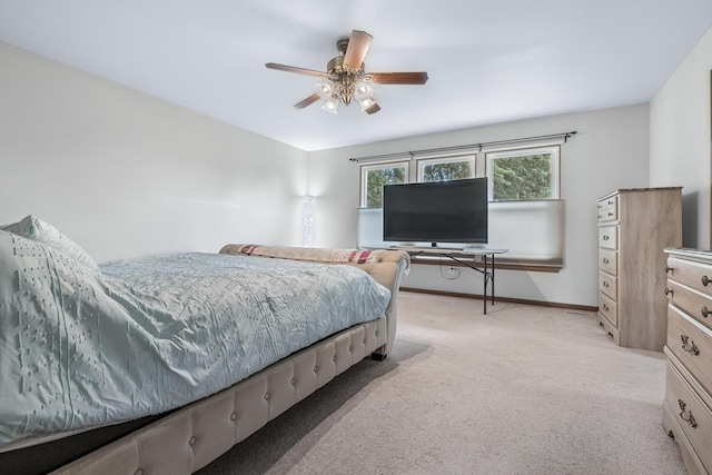 1860 Partridge Ln, Kalamazoo, MI 49009 - bedroom with light colored carpet and ceiling fan