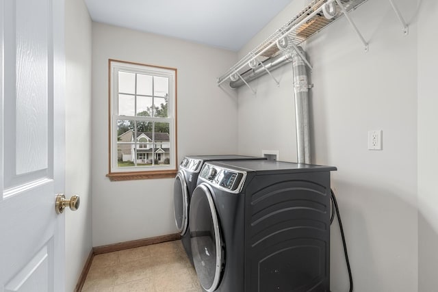 1860 Partridge Ln, Kalamazoo, MI 49009 - washroom with independent washer and dryer and baseboards