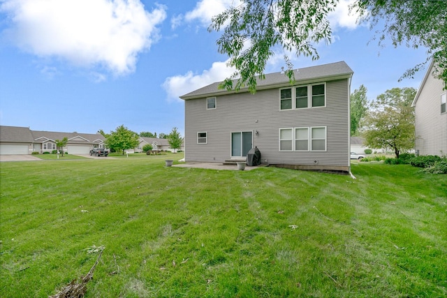 1860 Partridge Ln, Kalamazoo, MI 49009 - back of property featuring a lawn and a patio